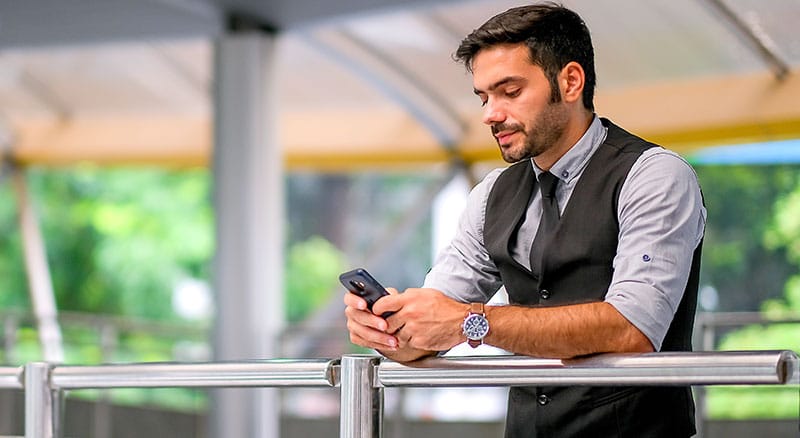 Everlytic | Blog | How Apple’s Mail Privacy Protection will Impact you | Blog Image | Caucasian Man Standing at Balcony