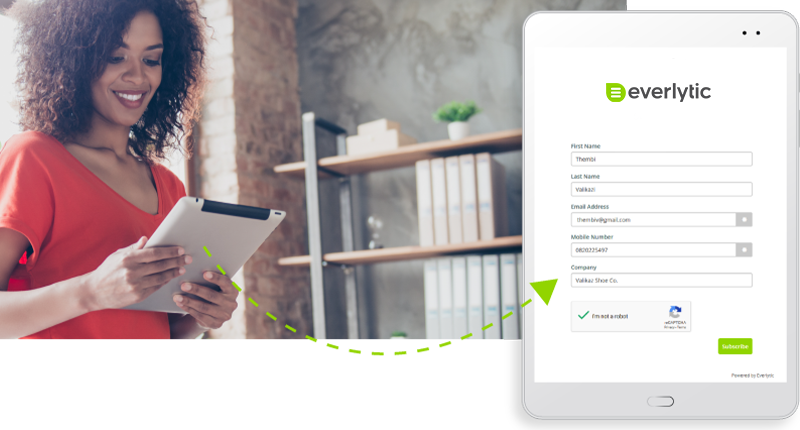 Unleash the Power of Your Digital Comms with Our New Zapier Integration_Everlytic Blog_Person Holding a Tablet with Mock-up of a Subscription Form
